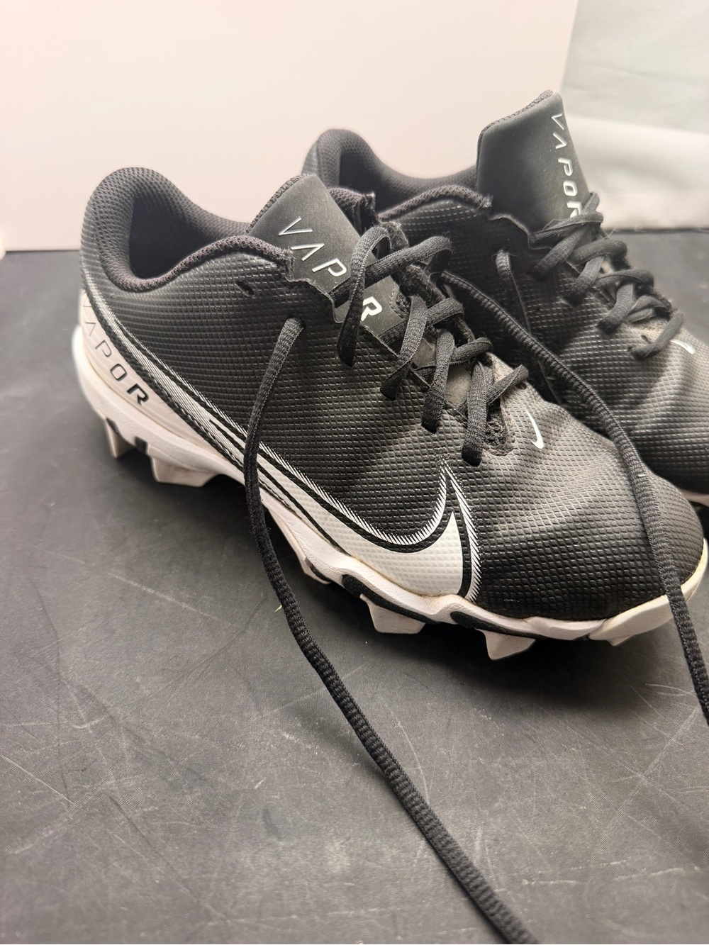 Nike Kids Black and White Vapor Football Cleats, in excellent condition